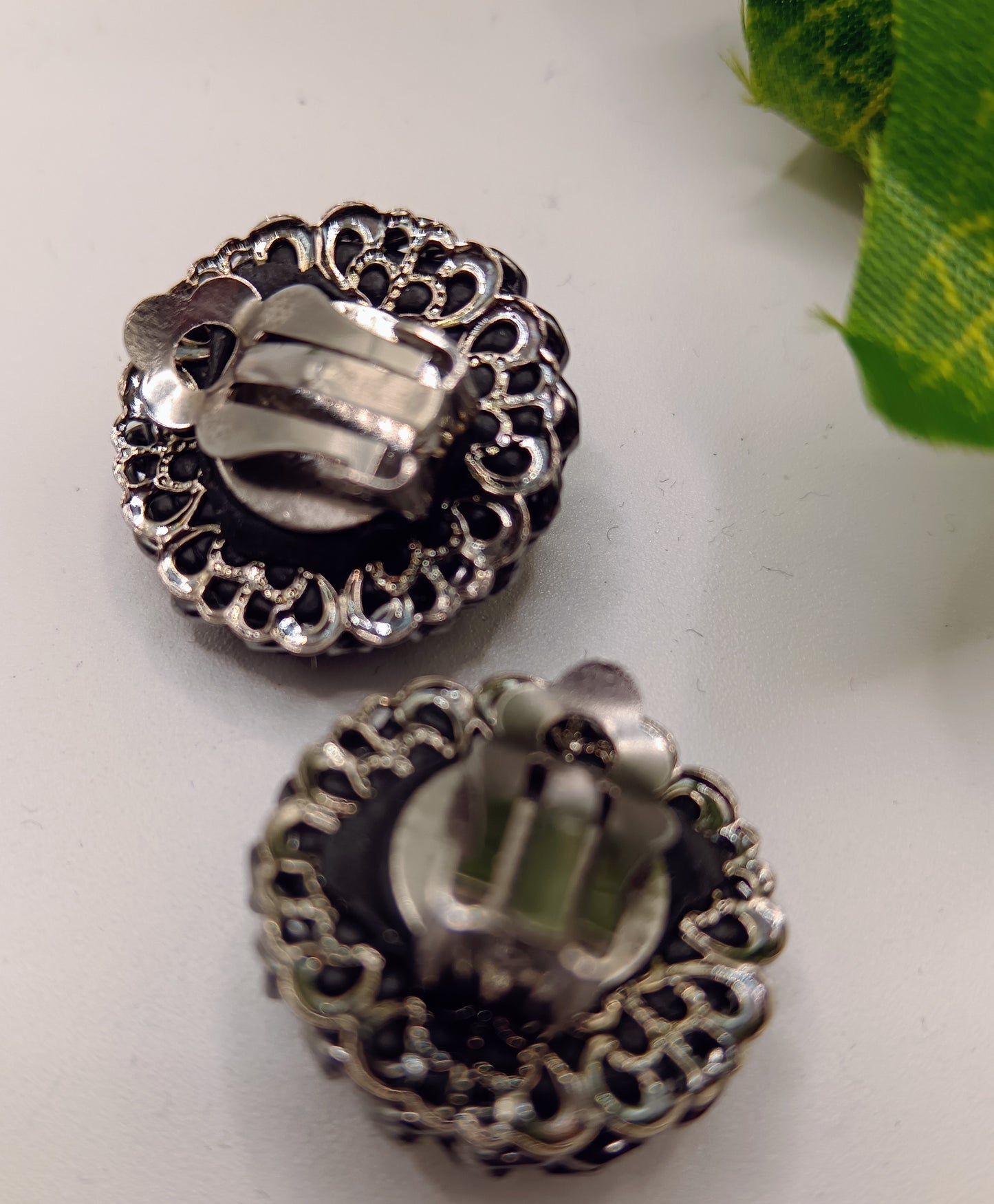 Orecchini clip con vortici di catene